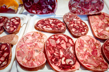 Selling chopped headcheese on stall, street market