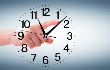 Obraz na płótnie Canvas Human Hand Holding Clock Time isolated on white