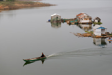 Houses and peaceful life on Lake Nam Ka, Dac Lak, Viet Nam