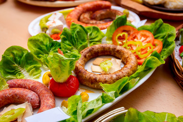 Traditional sausages are arranged for review at food contest