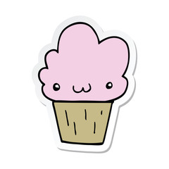 sticker of a cartoon cupcake with face