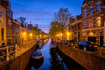 Naklejka premium Canal and houses in the evening. Haarlem, Netherlands