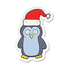 sticker of a cartoon christmas penguin