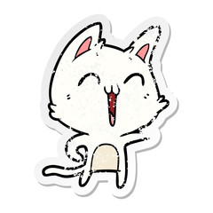 distressed sticker of a happy cartoon cat