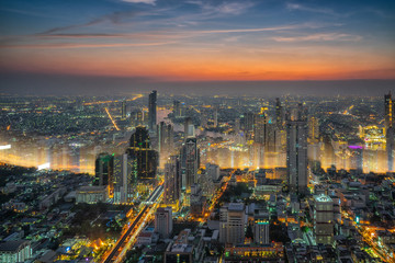 Bangkok city. Cityscape of Bangkok modern office buildings at night, Thailand.