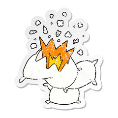 distressed sticker of a cartoon pillow fight