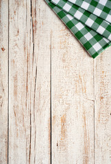 kitchen wooden board with green dishcloth