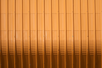 orange metal sheet pattern and vertical line design