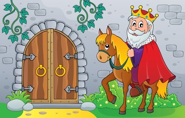 King on horse by old door theme image 1