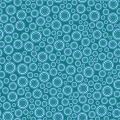 Seamless pattern, texture. Disjoint round elements of different sizes evenly scattered on blue background.
