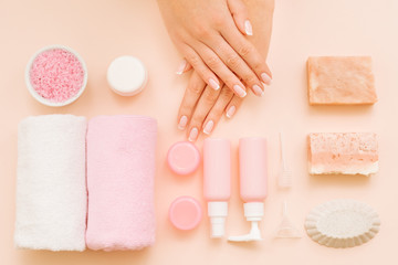 Hands beauty care. Spa salon treatment. Assorted cosmetic products organized composition.