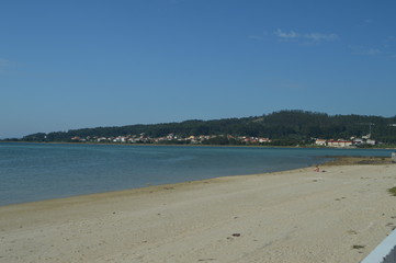 Stunning White Sand Beach At Sunrise On Toja Island. Nature, Architecture, History, Travel. August 18, 2014. Isla De La Toja, Pontevedra, Galicia, Spain.