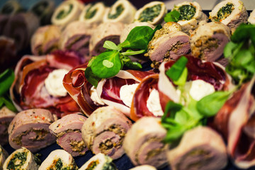 Appetizer roll with meat and bacon
