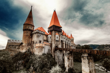 Fototapeta na wymiar Beautiful view of castle with wooden bridge and high towers