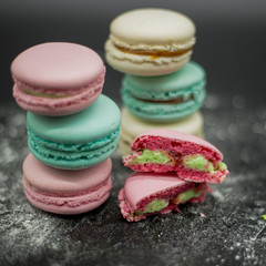 fruit macaroon with mint on black background