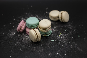 fruit macaroon with mint on black background