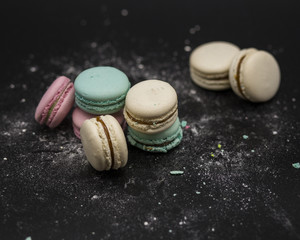 fruit macaroon with mint on black background