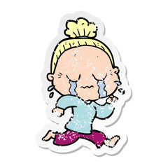 distressed sticker of a cartoon crying old lady