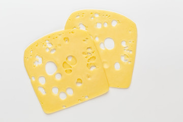 Cheese slice on white background.