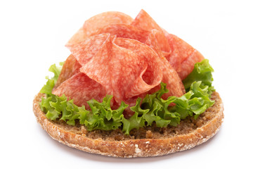 Sandwich with ham sausage on white background.