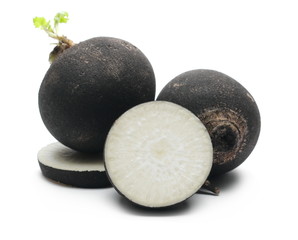 Black radish with slices isolated on white background