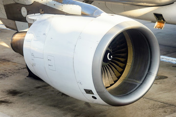 Engine of big passenger plane that waiting for departure in airport
