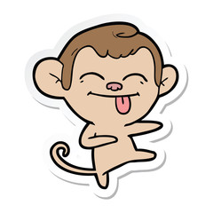 sticker of a funny cartoon monkey pointing