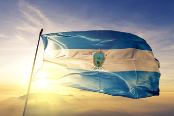 La Pampa province of Argentina flag waving on the top sunrise mist fog