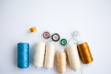 Sewing notions on a white ground