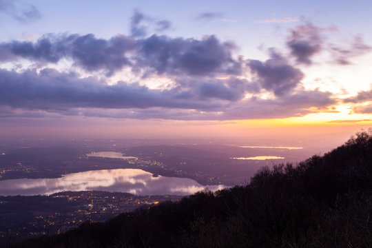 View of Varese province and the Lake District with Varese Lake from the Belvedere at Campo dei Fiori after sunset. Campo dei Fiori, Varese, Lombardy, Italy.