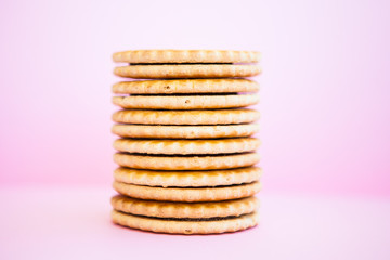 Pile of cookies on a pink ground