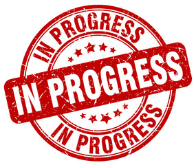 in progress red grunge round vintage rubber stamp