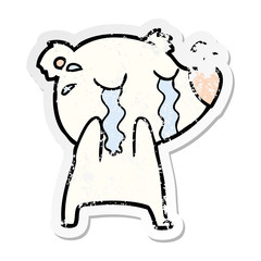 distressed sticker of a cartoon crying polar bear