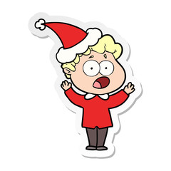 sticker cartoon of a man gasping in surprise wearing santa hat