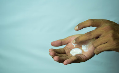 Applying moisturizing cream on hands. Skin care 