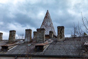 roof of an old house with chimneys