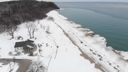 Michigan lake in Winter. Water, cold weather, bird's eye view, drone shots