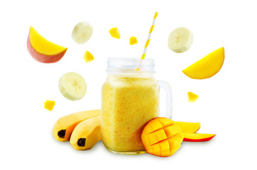 Mango banana smoothie on a white background