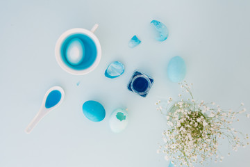 Top view of colorful easter eggs on white background