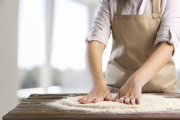 Wheat ears and flour on  background