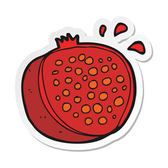 sticker of a cartoon pomegranate