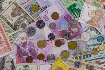 Background of banknotes and coins from different countries