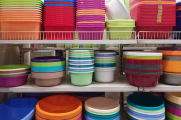 plastic containers and bins, many colors and sizes are placed in the warehouse.