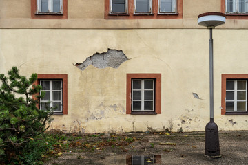The shabby facade of an old house.