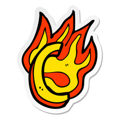 sticker of a cartoon flaming letter
