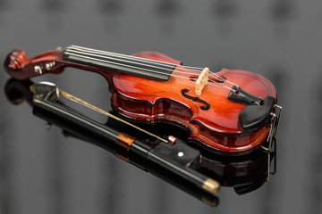 Violin on grey background