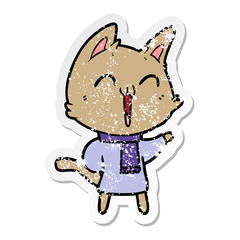 distressed sticker of a happy cartoon cat