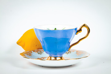 Single lemon and tea cup
