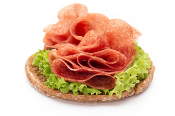 Sandwich with ham sausage on white background.