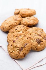 Chocolate oatmeal cookies on the  wooden background.